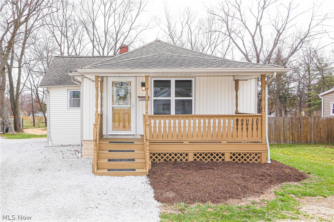 Welcome to Grove Avenue! This adorable 2 bedroom, open-concept ranch is turn-key and ready for it's new owners! Everything in this house has been completely redone. You're welcomed by a large front porch with plenty of room for you to relax and sip your favorite beverage on a beautiful day. As you open the front door you can immediately see how open it is from the living room to the dining room and the kitchen. The custom beam on the ceiling really gives this home character. The kitchen has tons of cabinet space and all appliances except the refrigerator stay! The laundry is conveniently attached to the master bedroom which also opens into a landing that leads to the basement or out to the back patio. This house was very well cared for -- Don't wait to see it!