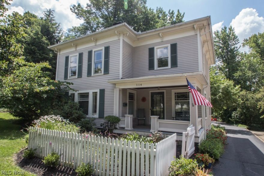 For a 3D walk-through of this property be sure to visit the virtual tour link.  Exceptional Historic, well-maintained home on the  Blossom Time Parade route in Chagrin Falls! Sit and relax on the beautiful front porch The welcoming entry opens to a light and bright formal living room with statement brick fireplace.  An office, adjacent to the living room, has built-ins galore!  The formal dining room opens to an updated eat-in kitchen with granite counters, SS appliances and gorgeous hardwood floors. The family room off the kitchen overlooks the deck and extra deep private backyard.  Perfect for entertaining!  The second floor is highlighted by the master suite and it's high ceilings, large walk in closet and glamour bath.  Three additional bedrooms and full bathroom up.  Rare first floor laundry and  three car garage in a historic home.  Excellent location within walking distance of schools, rec center and close walk on sidewalks into town. A truly special place to call home!