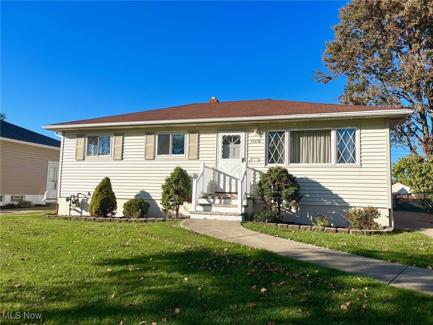 Meticulously maintained and filled with care, this ranch-style home radiates comfort from the moment you step inside. Freshly painted walls and gleaming hardwood floors invite you to explore a thoughtfully designed layout offering three distinct living spaces—a light-filled living room, a functional family room with access to the yard, and a finished recreation room in the basement. At the heart of the home, the spacious eat-in kitchen (updated in 2003) features ceramic tile flooring and all appliances included. Four comfortable bedrooms, each with hardwood flooring, provide flexibility for family, guests, or a home office. A full bath on the main level offers everyday convenience, and the addition of the fourth bedroom and family room expands both space and versatility. Downstairs, the large finished recreation room is ideal for a home theater, gym, or playroom. The lower level also includes a laundry area (washer and dryer included) with utility sink and water closet for added practicality. The detached two-car garage (built in 2006) complements the well-kept property, complete with a concrete driveway and garage floor (2005) and a nicely manicured yard ready for outdoor enjoyment. Major improvements include: furnace (2005), carpeting (2009), hot water tank (2010), roof, glass block windows, and refrigerator (2011), and dishwasher (2016). Lovingly maintained for decades, this home is a reflection of care and attention—ready for its next chapter. It’s a place where comfort, pride, and possibility come together.