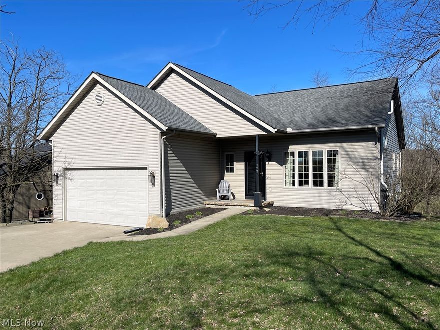 Apple Valley Lake Living! 777 Highland Hills Drive. 4 BR, 3 Full Bath Ranch w/Finished Walkout Lower Level. Inviting, shaded 28’ deck with covered patio and fire ring underneath. Clean, Bright, Lots of Daylight, Hickory Floors, Beautiful Gas Log Fireplace. Walkout Lower Level features a classy wet bar, projection TV setup, 2 Bedrooms, full bath, and lots of storage/workshop area. Main Level Laundry. Natural gas heat, central air, cable & high speed internet, public water & sewer.
Comes with a 1 year Home Warranty from HomeGard.Roof new in 2014; generator hookup; radon mitigation system. Apple Valley…Ohio's best kept secret...Ownership in Apple Valley gives you access to private amenities that include: 511-acre boating, swimming and fishing lake, 3 beaches, clubhouse with outdoor pool and fitness center, community center with an Olympic-size indoor pool, full-service marina, camping, dog park, trails, fishing park, event areas, and more! Adjacent to one of the best public golf courses in Ohio. Dues & Assessments only $351/lot/year. *Lot lines in photo are approximate*. Located in the rolling hills of Knox County, 5 min east of Mt. Vernon, within 30 min of Mansfield, 20 min to Mohican Country, 60 min to Columbus, 90 min to Cleve-Akron-Canton areas. Also easy access to Snow Trails, Loudonville, Mohican Country, Mid-Ohio Race Course and Amish Country.