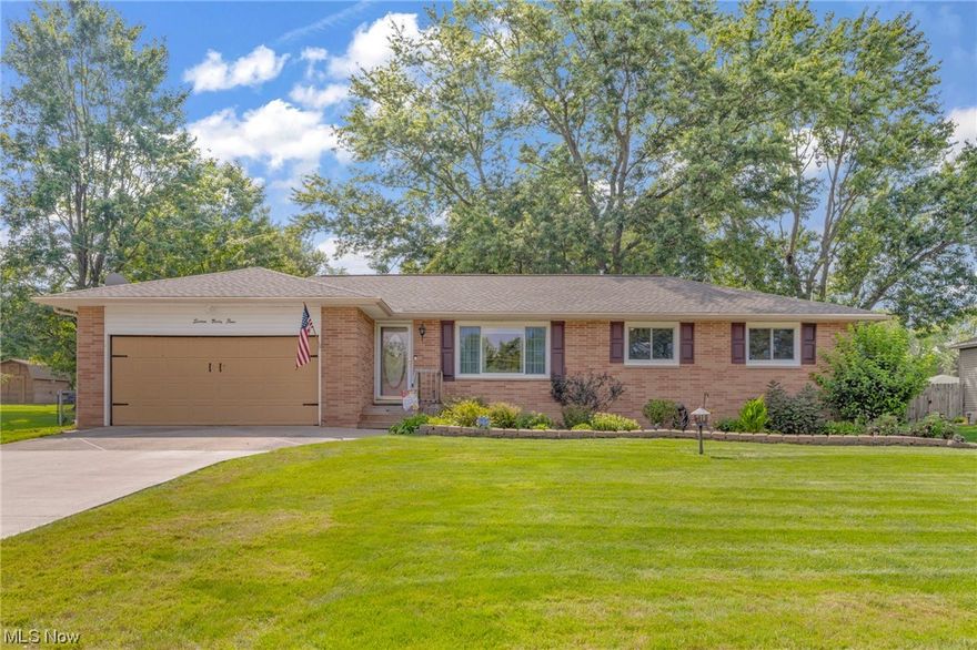 Stunning brick ranch offers modern elegance and classic charm. The front-facing Living Room bathes in natural light through a sizable window. As you journey further, a spacious Family Room, elegant Dining Room, and a breathtaking galley kitchen unfold before you. Adorned with pristine white cabinetry, abundant counter space, and tasteful recessed lighting, the kitchen is a haven for culinary creativity. Glass sliding doors seamlessly connect the Family Room to an expansive backyard deck, where endless moments of leisure and entertainment await. The master bedroom exudes comfort with two large windows and a soothing ceiling fan and an en-suite master bathroom offers privacy and convenience. Descend to the partially finished basement and discover a sprawling living space illuminated by recessed lighting, perfect for recreation or relaxation. The laundry room boasts a folding counter, ample cabinetry, and a utility sink, adding a touch of practical luxury. Outside, the meticulously landsc