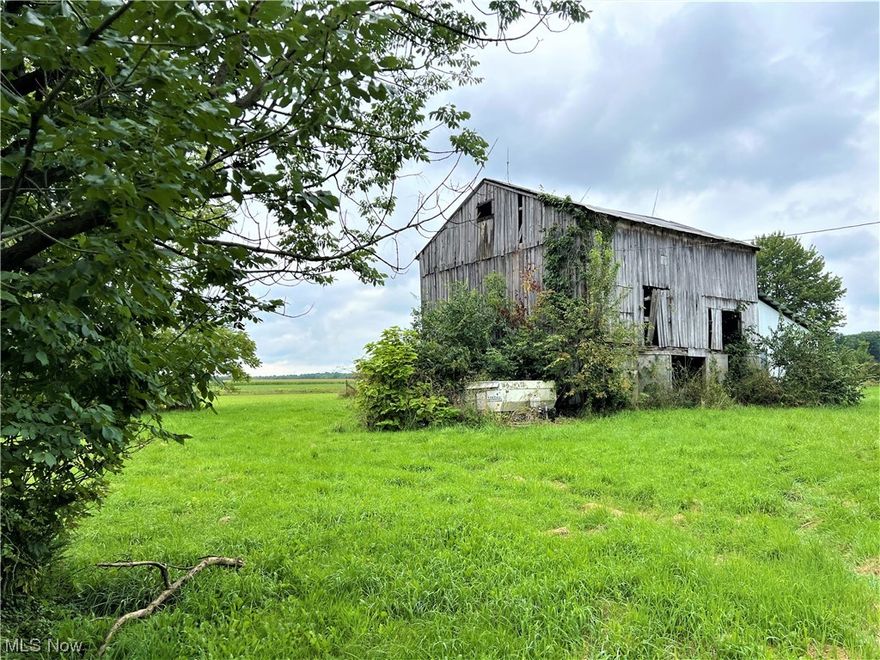 This amazing property of 4 parcels totaling 13.91 acres has so much history and potential for new owners! Unfortunately the home is uninhabitable, (to be demolished) but the barn and garage will stay. Parcel 1) sits on 6.13 acres with a creek. Parcel 2) 5.01 acres of agricultural harvest or grazing for animals.  Parcel 3 & 4) looks like it may have a small crab apple orchard.  The Large Maple tree in front of the home historically would produce sap for the family to make homemade syrup. Imagine rebuilding this property to a fruitful farm with crops and animals! It's a must see property with an open mind and a love for the land! Utilities at street include Electric, has a water well in front of home, and would be heated with oil, will need a complete septic system. Property is being sold "AS IS".  Farming Equipment DOES NOT stay and will be removed. Please have all parties sign a Release of Holds Harmless Agreement before showing the property.   Owner is open to offers.  Call for details on Demo options.