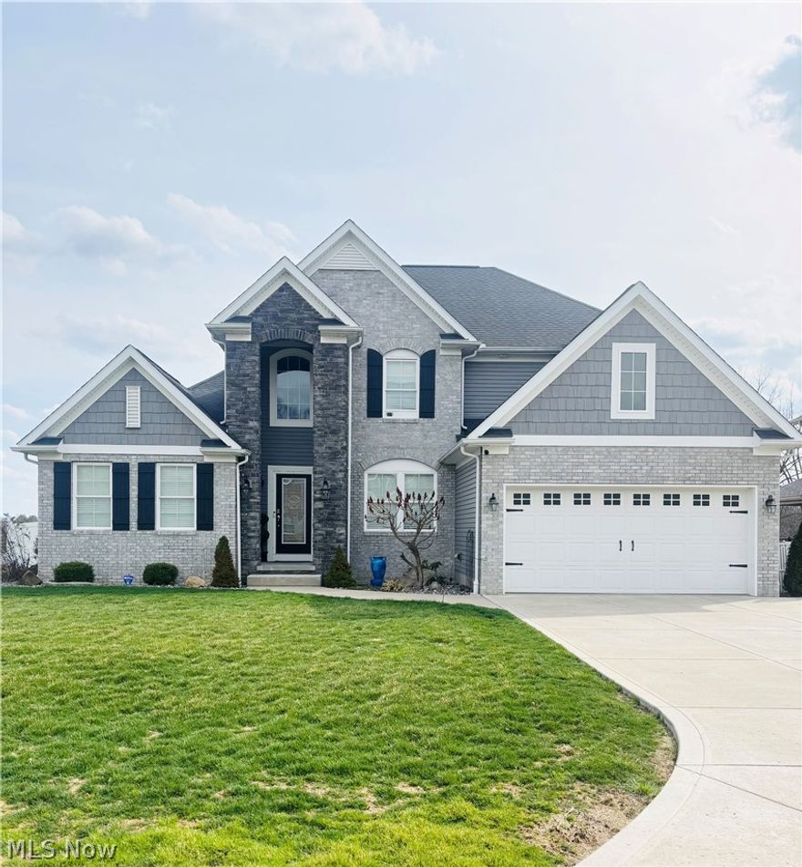 Welcome to 24 Morningside Woods Dr in Wintersville. Oh. This stunning residence offers everything you've been looking for in a dream home. The heart of the home is the massive living room with vaulted ceilings and beams, a wall of windows overlooking the in-ground pool,  and an impressive fireplace. This home is designed for modern living with a master suite on the first floor, 3 bedrooms and 2 full bathrooms on the second providing privacy and comfort for all. The island kitchen features custom cabinets, quartz countertops, a stylish brick backsplash, and a generous pantry for all your storage needs. The spacious primary suit is a true retreat, featuring a luxurious en suite bathroom complete with dual sinks, a separate walk-in shower, and a relaxing soaking tub. A large walk-in closet provides ample storage and organization space. 3 Additional flex rooms provide you with endless possibilities. With this newer build, thoughtful details, and plenty of room to live and entertain, this home is ready to impress. Don't miss your opportunity to make it yours!