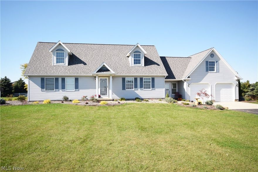 One-of-a-kind 5.5 acre mini farm with 4 car garage, 18x36 heated in-ground pool (new liner), barn with large pasture (horses or cattle permitted) and incredible wide open striking views! Built in 1993, completely remodeling in last 3 years, over 2800 square feet. Brand new expanded kitchen with granite counter-tops, bar top seating and gorgeous copper farmhouse style sink. Large dining area. Spacious first floor master suite with newly updated bathroom. First floor laundry. Family room w/cathedral ceiling & brick fireplace. Second floor includes large bedrooms and bonus room! Quality vinyl fence outlines the pasture, corral and the pool area. Exterior includes covered vinyl deck and patio surrounding the pool. Detached 32x24 garage perfect for working on cars or great boat/camper/atv storage. Barn includes 3 horse stalls, tack room and a loft for storage. The pasture is approx. 2.6 acres and is split into two sections great for any type of livestock. This truly is a rare find and a perfect set-up in the award winning Tuslaw LSD! Don't wait for the sold sign, call today to set up your showing!