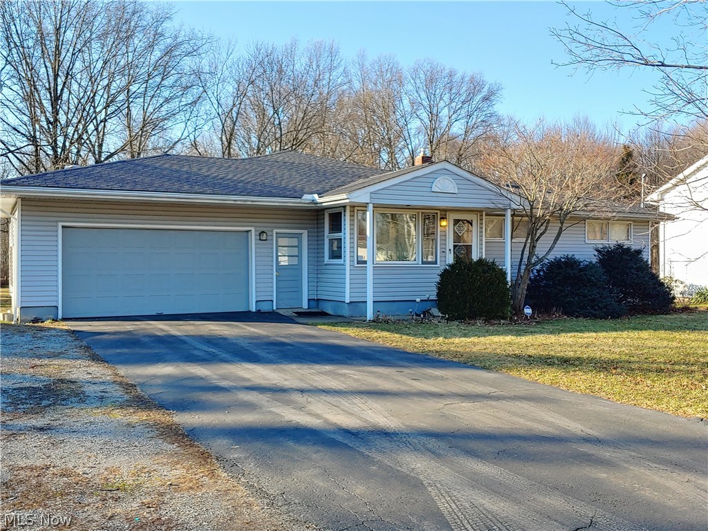 Welcome to 604 Elm Street! A quick, 10-minute drive to various shopping and restaurant locations, this beautiful, ranch home with a semi-open floor plan has so much to offer...from the small, quiet neighborhood to the partially finished (poured) basement boasting an additional bedroom, remodeled full bath, with new flooring (2024) and small living area, a perfect private suite! Other features include new paint recently throughout; a stunning addition with vaulted, soaring ceilings, recessed lighting, large windows and a backlit, built-in shelf that surrounds the room, which is wired for theater sound; and the kitchen, with newly-installed flooring (2023) and trim (2024) is in the heart of the home with a serve-through window that lets a ton of light flow into the room. The master bedroom with hardwood floors, the second bedroom with hardwood floors, as well as a wall of built-ins and the third bedroom with carpeting under which we suspect hardwood flooring, round out the main floor. From the great room, you can enter the covered back patio, complete with enough room to accommodate your patio furniture and grill, with ceiling fans to keep you cool in the hot days of summer! Not only will you enjoy a wooded view and a large backyard, but you will also find a double shed with a newer roof, and a small above-ground pool for extra refreshment. Kitchen appliances (electric range also set up for natural gas) stay with the home and includes a one-year, 2-10 home warranty!