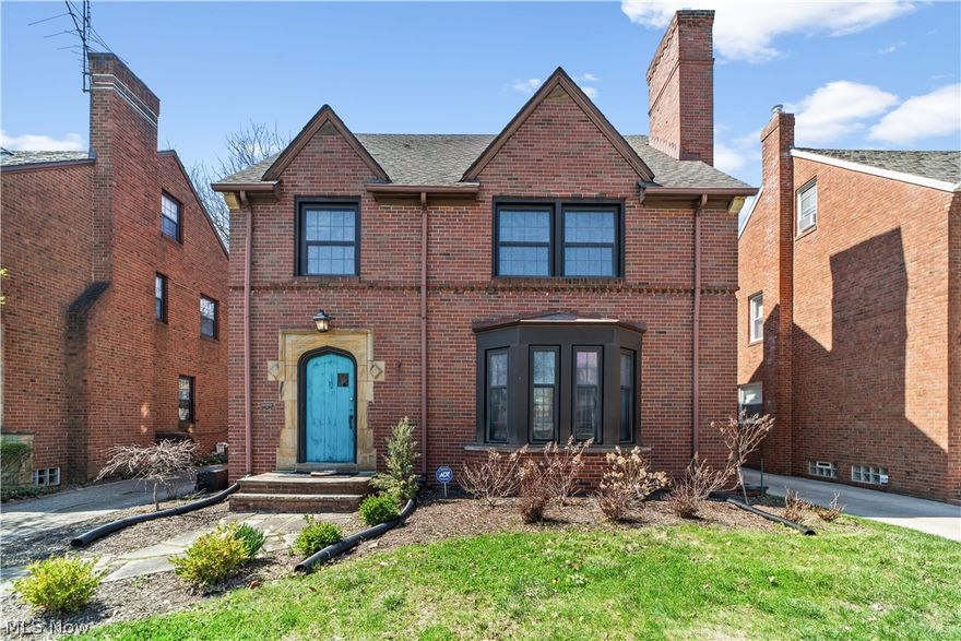 Classic brick Colonial charm meets move in ready comfort in the heart of University Heights. This beautifully maintained 4 bedroom, 3 bath home offers timeless architecture, thoughtful updates, and flexible living across multiple finished levels. Hardwood floors flow throughout the main living areas, where natural light fills a spacious living room and into the formal dining room, which easily accommodates gatherings large and small. The kitchen features stainless steel appliances and generous workspace perfect for everyday living. The second-floor hosts comfortable bedrooms, excellent closet space, and a full bath, while the finished third floor suite provides a private fourth bedroom with its own full bath, ideal for guests, a home office, or teen retreat. The remodeled basement adds valuable living space with a recreation room, second fireplace, laundry area, and ample storage perfect for a media room, workout space, or playroom. Additional highlights include central air, newer windows, a detached two-car garage, and a charming backyard with deck ideal for enjoying warmer months. Located on a quiet street yet close to John Carroll University, the Trader Joe's coming this fall, Cedar-Fairmount, University Circle, award-winning hospitals, and downtown, this home offers both character and convenience.