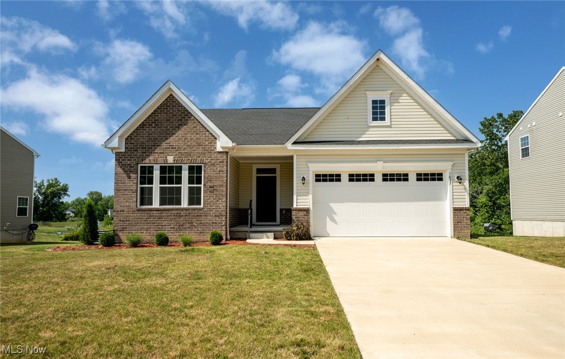 welcome to this stunning ranch home at 1637 Duncan Way in Streetsboro. Enjoy the convenience of the first-floor living in this beautifully maintained residence featuring three bedrooms and two baths on the main levels. The primary suite boasts a tray ceiling, walk-in closet, and double vanity. The laundry room is conveniently located next to the primary bedroom for added ease.
The upgraded eat-in kitchen showcases stainless steel appliances, while the spacious dining room offers access to a covered porch - ideal for entertaining or relaxing outdoors. A finished basement with a full bathroom provides additional living space and versatile recreation area.
Don't miss the opportunity to make the exceptional home yours - schedule your tour today!