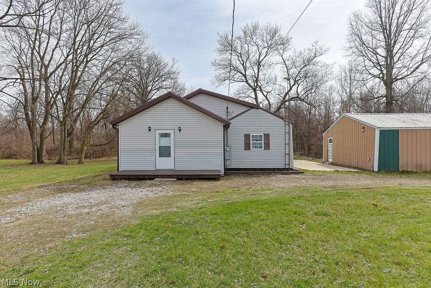 Looking for privacy, land, and character—without giving up in-town conveniences? Welcome to 250 Woodlawn in Norwalk. This unique 2-bedroom, 1-bath home sits on 3.14 acres, offering the perfect blend of peace and practicality with public water and sewer.

Inside, you’ll find a clean, well-maintained space with some newer carpet, a nicely sized kitchen, and multiple rooms that give you space to spread out. Whether you’re a first-time buyer or looking to downsize, this home is cozy as-is and also offers room to grow if you’d ever like to add on.

Outside is where it really shines—3.14 acres with a 24x28 pole barn (garage door and concrete floor), an additional shed for extra storage, and plenty of open land to enjoy the deer, turkeys, and other wildlife, all with the kind of privacy that’s hard to find this close to town. If you’ve been dreaming of a simple home with room to breathe and space for your ideas, this is the one you’ll want to see.