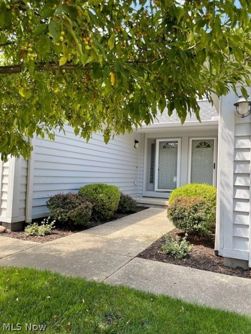 Beautifully remodeled 2 bedroom townhome. New Driftwood Grey soft close kitchen cabinets with upgraded granite countertops, Glass Marmol Mosaic backsplash and stainless steel appliances. The eat-in kitchen opens to the great room for easy of entertaining and sliding glass doors to your deck. The two bedrooms up both feature vaulted ceilings, plant shelves and double racked closets.  The lower level is finished and has a 2nd FULL bath and glass block windows.  A two car attached garage with opener that accesses to the kitchen for your grocery unloading.  Metro parks with endless bike and walking trails are next door.  Clubhouse offers both an indoor and outdoor swimming pool, tennis courts and event rental space.  Close proximity to freeways and centrally located between downtown Cleveland and Akron.