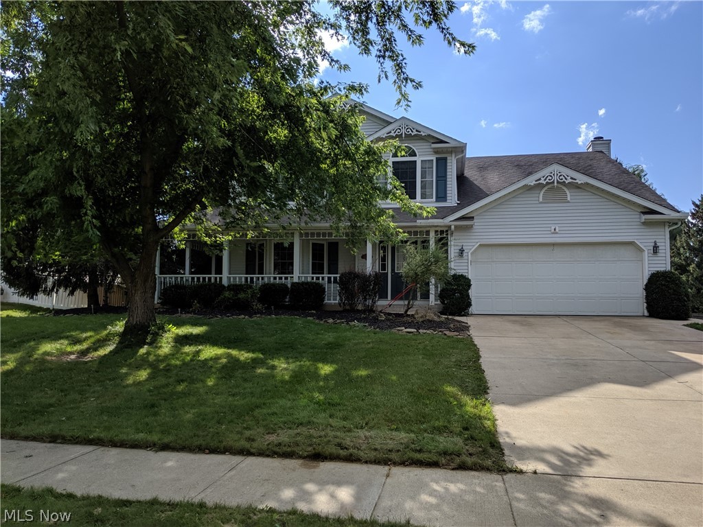 Walk into your custom home in a desirable neighborhood in Historic Medina! Located on a cul-de-sac and close to schools, parks, highways, and shopping! Enter from the wrap around front porch into an updated colonial with bay windows in the living room and large master suite on the second floor. A kitchen upgraded with granite counters, hard wood floors, and a sliding door to walk out and enjoy your multi level deck with a retractable awning, and a custom built gazebo. The kitchen is open to the bright family room with a ceramic surround fireplace. Upstairs is your master suite with private bath, three bedrooms, one with a soaking tub and bath, a bonus room, and another two full baths. The basement is partially finished with Owens Corning finishes. Don't miss this one!