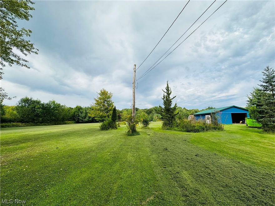 READY TO BUILD? This is a 5.10 acre lot in Morgan Twp. WITH ELECTRIC, POLE BARN, SHED, SEPTIC, AND ROUGH DRIVEWAY!