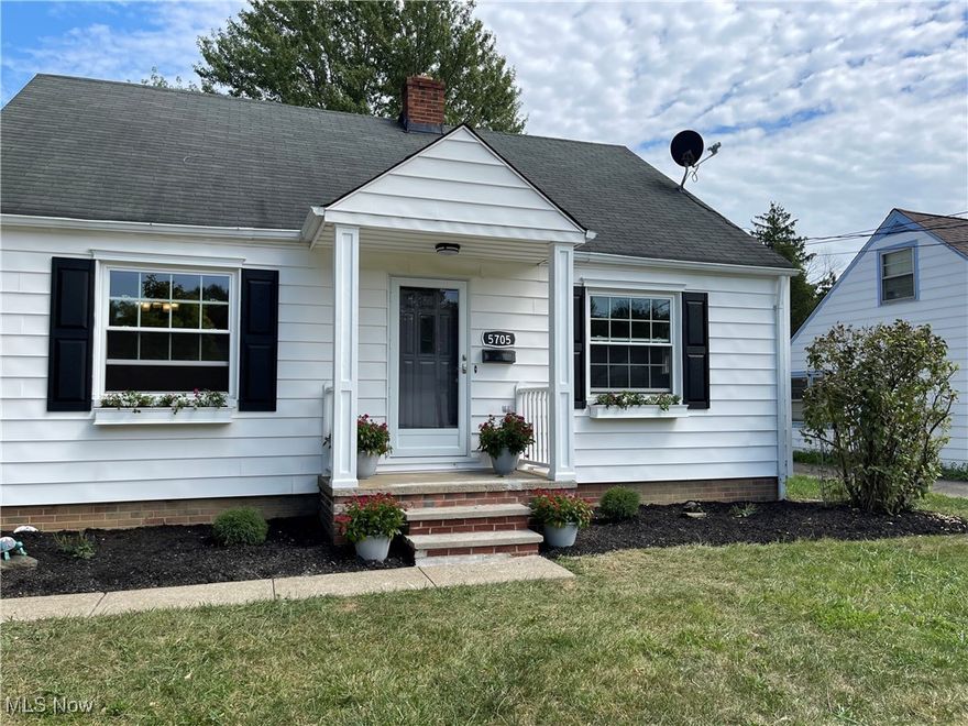 Updated Bungalow! This delightful 3-bedroom home features vinyl windows installed in 2020, along with a new furnace and central air system added the same year. A new hot water tank and electrical box were also installed in 2020. The spacious open living and dining area creates an inviting space for entertaining. The remodeled kitchen showcases white cabinets and hardwood floors, with all appliances included. The 1st floor boasts hardwood flooring throughout, featuring a 1st floor bedroom and a full bath. Upstairs, you'll find two additional bedrooms and another full bath. The waterproofed basement provides plenty of storage, while the backyard is complemented by a two-car garage.