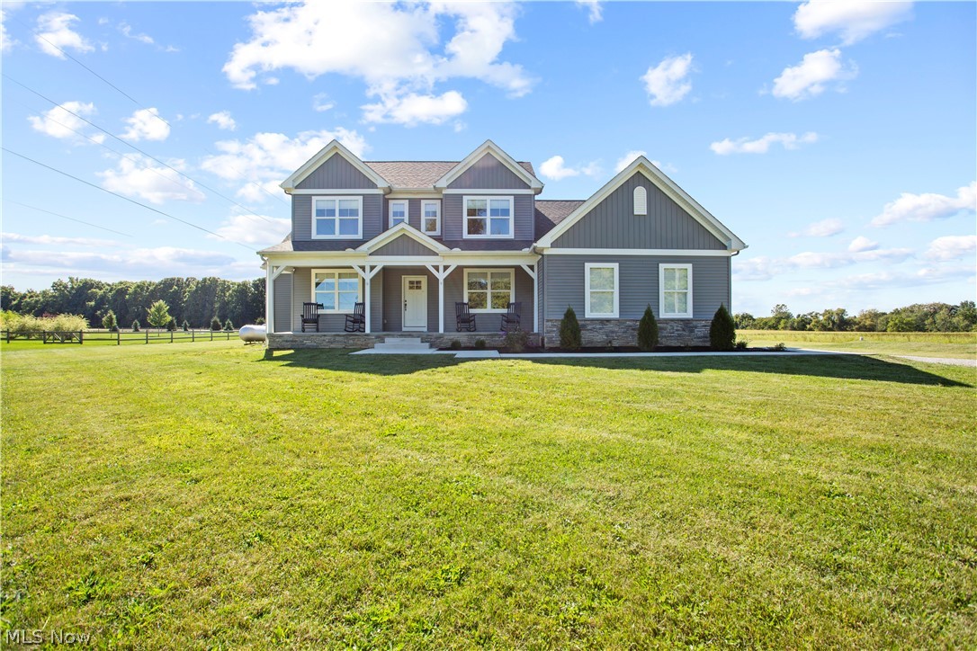 This custom home, built by Lapos Construction, is situated on a dead-end street minutes from the metro parks. Only three years old, this stunning home offers a spacious open floor plan with upgrades throughout. The kitchen features quartz countertops, top end Samsung built-in appliances, Aristokraft cabinets, under-cabinet and recessed lighting, walk-in pantry, and a pot-filler fixture over the range top. The great room boasts 12' ceilings and a wall of windows overlooking the expansive back yard. From the great room, you can make your way to the cozy office/den, or to the offset entrance to the master suite. There you will find a roomy master bedroom, walk-in closet, and a master bath that offers dual sinks, soaking tub, and a custom shower stall with glass surround. Completing the first floor are the laundry room, mud room, and half bath. The second floor is home to bedrooms 2 and 3, both with walk-in closets, and a full bath. All rooms in the home have custom window treatments. Upgr