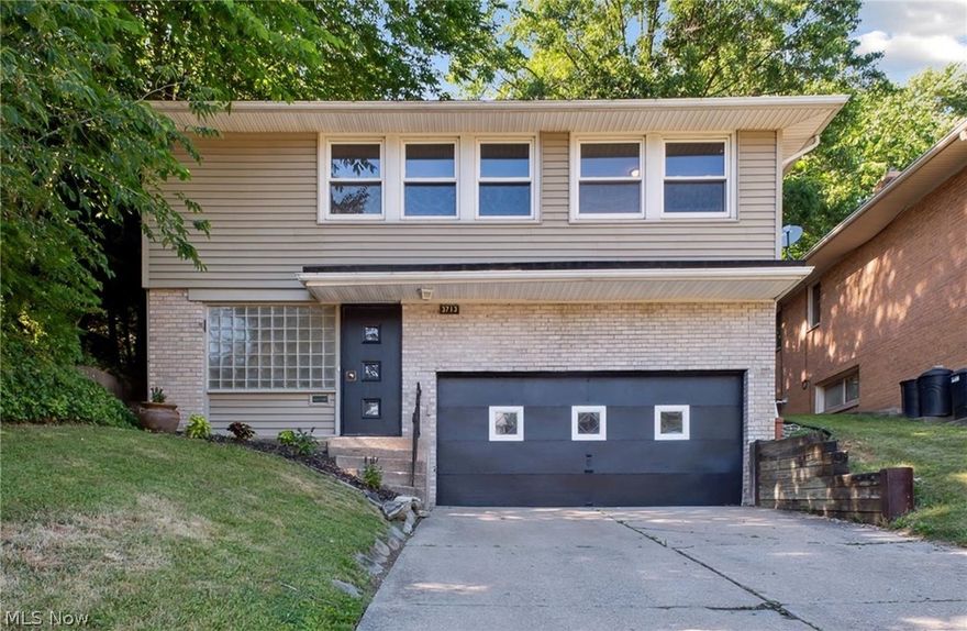 Welcome Home to this Unique Bi-level House W/Private Setting, Updates and Features! 4 Bedrooms, 2 Full Bath. Beautiful Harwood & Ann Arbor Oak Laminate Flooring. The Main Floor Offers Open Floor Plan with a Large living room, Dining area and Kitchen with Stainless Steal Appliances . 3 Bedrooms and a Full Bath. The Entree Level Offers a Large Family/TV Room and a Master Bedroom / Potential in-law Suite with it's own Full Bath. 2 Car Attached Garage. Enjoy the private Backyard that is Perfect for Entertaining. Close to Shopping and Easy Commute to Downtown Cleveland and Major Hospitals. Contact us for Showing Today!