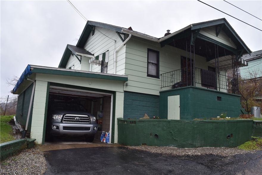 Cozy 2 bedrooms home with 1 full bath, a formal dining room, and a 1 car attached garage. Enjoy this summer on the large rear deck with a nice view of the Ohio Valley. Hot tub stays. Per seller A/C unit is only a couple years old. Located on a dead end street.