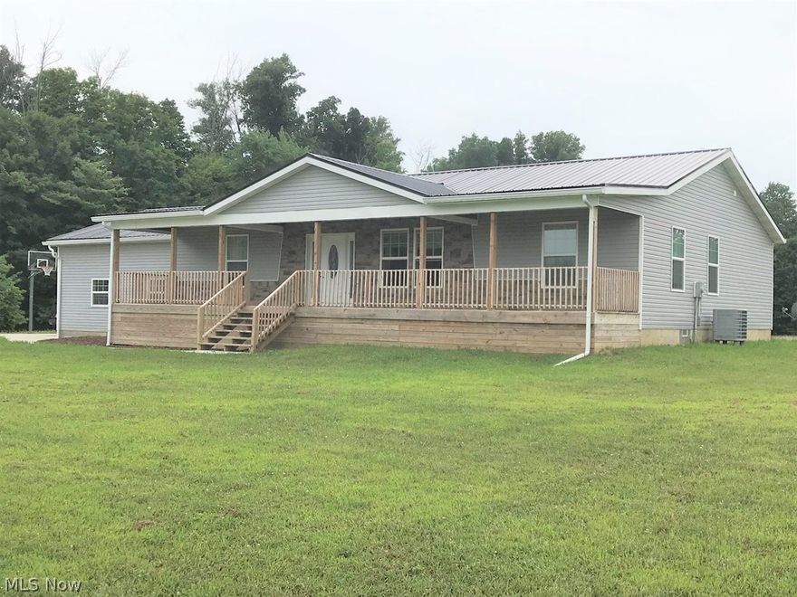 1185 Boyce Parkway, Ontario…Brand New 3 BR, 2 BA Ranch on your own personal cul-de-sac street, located minutes from shopping, dining, schools, churches and commuting highways. This level 2.8 Acre site includes about an acre of yard and an acre of nice woods for adventures, wildlife and firewood if so desired. Wide open great room with a rustic feel. Kitchen has new stainless appliances. Enjoy a cup of coffee on the 8’x50’ covered rocking chair porch. The master suite is something to behold with a large bedroom, custom bath, with walk in ceramic rain shower and a handsome stone-wrapped jet tub with fireplace heater and TV hookup to Calgon your day away…All bedrooms have wall jacks and plugs for TVs. This 1800 sf house has an extra unfinished 1800 sf basement awaiting your growth or storage plans. (This one is in contract but a strong offer with good terms could possibly bump it and move into first position). Ask for details. Immediate Occupancy.