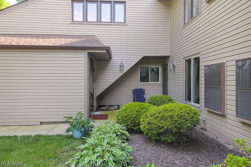 Welcome home to the desirable location at Trees Condominiums. Enjoy single floor living in this upper unit 2 bedroom, 2 bathroom condo with a private balcony that overlooks the tranquil wooded setting. The bright and cheerful eat-in kitchen allows for an abundance of natural light shining through the skylight. The large living room has plenty of space to entertain family and friends, with glass sliders that open to the balcony. The primary bedroom with ensuite bath includes 2 closets and also has it's own access to the private deck. The attached garage offers extra storage space with cabinets and a loft. This hidden gem is just minutes to Chagrin Falls Village, shopping, restaurants, parks, and highways.

The HOA by-laws are being amended to state no short term rentals allowed.