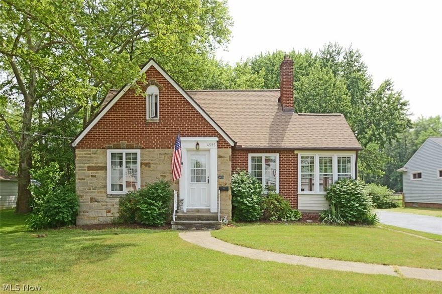 This bungalow has so much more to offer than what you see from the street. Owners put a beautiful addition off the back of the house, creating a huge eat-in kitchen and open concept living space. The first floor also has a living room in front with a fireplace and a sunroom off of it, and a large bedroom and a full bath. The entire first floor has hardwood floors as well. Upstairs there are 3 more bedrooms and a full bath. The basement is partially finished into 2 rooms, plus a utility room, laundry room and a full bath with walk-in tile shower. There are so many valuable updates in this home as well including updated energy efficient windows, a new roof, and a new furnace. Outside this brick bungalow sits are just under 1 acre and offers a 4 car garage plus storage shed!! The driveway is more than double wide as well, so parking is never an issue. This is truly a unique and amazing opportunity in North Olmsted in this price range!