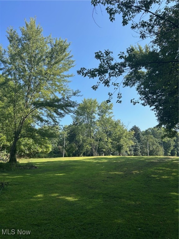 Build your dream home on this 2.83 acres in Coventry Township! Convenient location - close to shopping, hospital and park. 8 Minutes to highway. Open area and lots of private woods in the back.