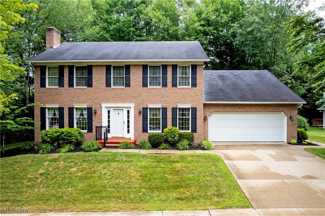 Discover timeless charm in this classic colonial home located in one of Wooster’s most desirable neighborhoods. This quality-built 3-bedroom, 2.5-bath residence offers a perfect blend of traditional style and modern comfort. Nestled on a beautifully wooded lot, the setting provides a peaceful and private backdrop with mature trees and natural beauty all around.
Step inside to a spacious living room featuring a cozy fireplace—ideal for gatherings or quiet evenings at home. The formal dining room is perfect for entertaining, while the dedicated office with a full wall of built-in shelves is a dream for remote work or a personal library.
Enjoy the changing seasons from the comfort of your screened porch, which overlooks the serene backyard. The large master suite includes a walk-in closet and offers a quiet retreat at the end of the day.
Additional highlights include hardwood accents, plenty of storage, and great curb appeal. This is a home with character, comfort, and a location that puts you close to everything Wooster has to offer.