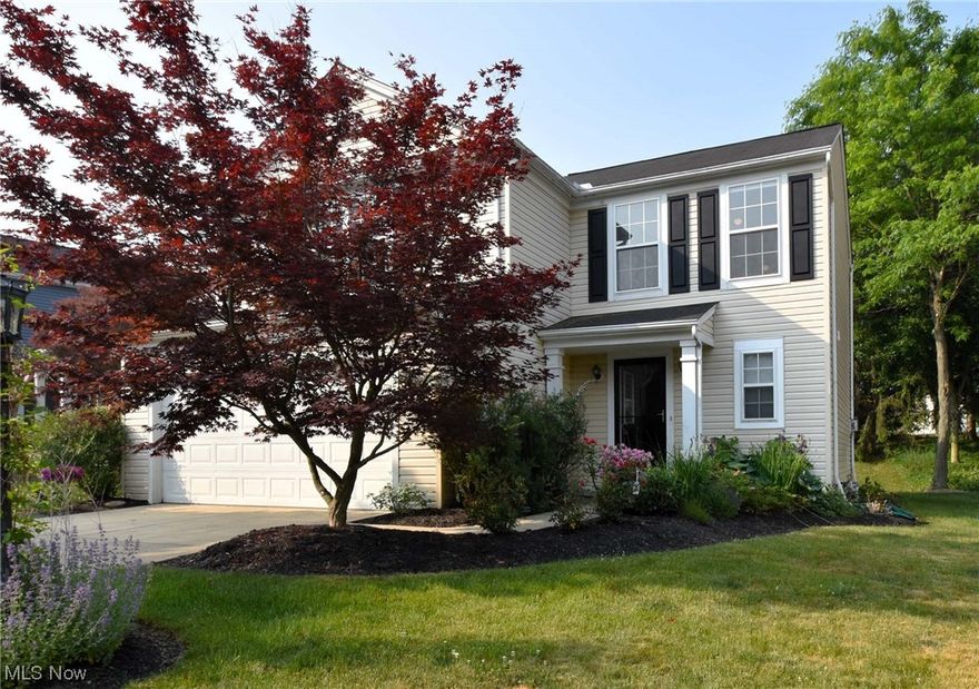 Impeccably maintained 4-bdrm, 2.5-bath colonial in the highly sought after Trails Crossing cluster community within Eaton Estate! High quality finishes, a warm, neutral color palette & open concept layout are sure to please today's buyers looking for modern, comfortable living without any updates to make. The spacious kitchen features Quartz countertops, ceramic backsplash & floors, center island, under cabinet lighting & stainless steel appliances that remain. A sliding glass door off the ample eat-in area leads to the deck & backyard. The great room is open & airy with a corner gas fireplace & streaming natural light from oversized windows. First floor laundry is tucked away but conveniently located off the garage & kitchen. Washer & dryer convey. A half bath is found right off the foyer for guests. The second level houses four generous sized bedrooms all appointed with gorgeous hard wood floors, ceiling fans & trendy window treatments. The primary suite is an inviting haven with a s