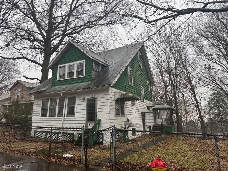 Large 2.5 Story Home with Full Walk-Out Basement with Tons of Storage. Spacious size home with Two First Floor Beds, Full Bath, Living Room, Dining Room. Large Finished Third Floor Attic. The Homes Second Floor is equipped for separate living with a Full Kitchen, Full Bath, Living Room, Bedroom. The Enclosed Front Porch has perfect access to create Separate Entries making this a Two Unit Property! There is Side Door Access to the Basement and Porch with Access to the Main Floor Unit. Double Parcel with Chain Link Fencing. Access to the Built in 2 car Garage from Rear Alley. This Property is to be Sold AS-IS. Buyer is responsible for due diligence in researching all taxes, assessments. Seller will not pay for inspections, warranties, repair, surveys.