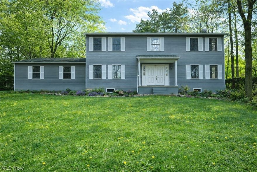 Come see this spacious 4-bedroom, 2.5-bath Colonial offering a perfect mix of charm and modern updates. Step inside to find all-new flooring and fresh paint throughout. The large master bedroom features a walk-in closet and a cozy fireplace, providing the perfect retreat at the end of the day. Enjoy the large enclosed back porch—ideal for relaxing or entertaining year-round. The home has been refreshed with updated lighting, new hardware, epoxy-finished showers, and LVT flooring in the bathrooms. Major mechanical updates include a new hot water tank, upgraded electrical panel, and minor plumbing improvements. This home is move-in ready and waiting for its next owner to enjoy all the recent upgrades.