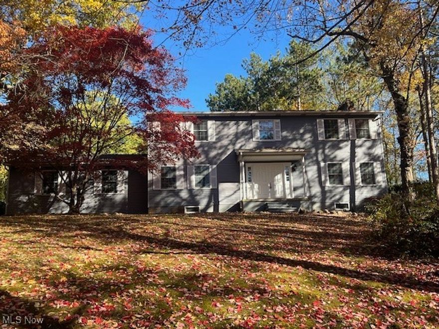 Come see this spacious 4-bedroom, 2.5-bath Colonial offering a perfect mix of charm and modern updates. Step inside to find all-new flooring and fresh paint throughout. The large master bedroom features a walk-in closet and a cozy fireplace, providing the perfect retreat at the end of the day. Enjoy the large enclosed back porch—ideal for relaxing or entertaining year-round. The home has been refreshed with updated lighting, new hardware, epoxy-finished showers, and LVT flooring in the bathrooms. Major mechanical updates include a new hot water tank, upgraded electrical panel, and minor plumbing improvements. This home is move-in ready and waiting for its next owner to enjoy all the recent upgrades.