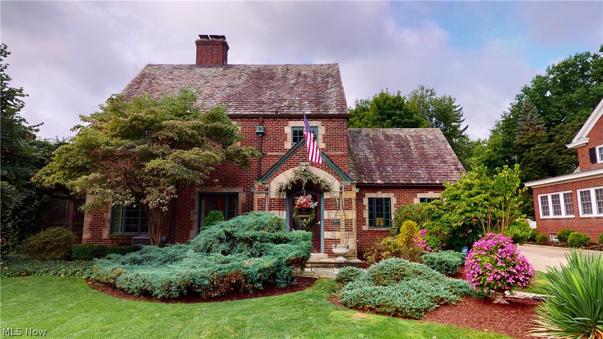 Pride of Ownership! You will enjoy viewing this unique home. This 4 bedroom Tudor home is cozy but also very chic. As you enter the home you will notice the seller attention to detail and great use of space. The living room has a fireplace and is very spacious. The is a garden room off of the living room it is bright and cheery perfect for morning coffee. There is a formal dining room but it is open to the kitchen for entertaining. The kitchen has been updated to a dream kitchen.
It has custom cabinetry and granite counter tops. There are 2 sinks, 2 dishwashers, 2 refrigerator drawers, pull out pantry columns, convection oven, warming drawer, Kitchen aid appliances, and much more. There is also a family room with a wet bar. Upstairs are 4 bedrooms. The master bedroom and bath have been completely renovated. As you enter the master bedroom with the electric fireplace and ceiling beams you will feel like you are in the South of France. The master bathroom has heated marble floors and a