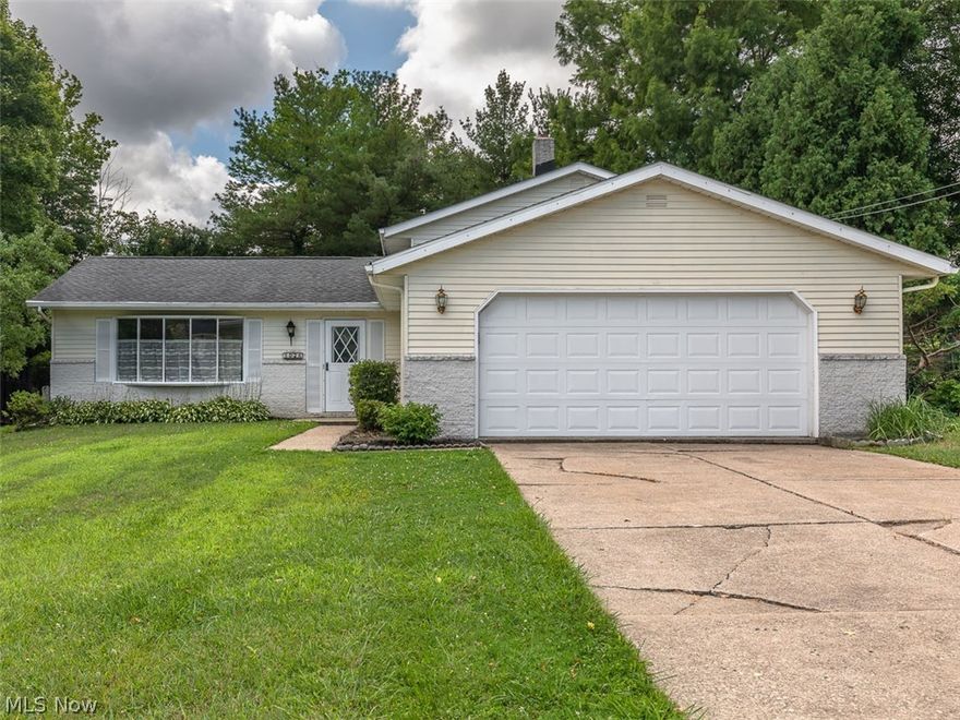 Amazing location, close to the Lake, parks, restaurants, shopping and Mentor Lagoons. Mentor Schools- Orchard Hollow Elementary- Shore Middle School- Mentor HS. 4 bedroom, 1.5 bath split level. Approximately 1,700 sq.ft. Living room features large bay window. Dining room has slider to sunroom. Kitchen with breakfast nook is open to the lower level family room.   Lower level bedroom with private entry. Easily accessed large crawl space attic for storage. Interior recently painted and carpeted. New AC less than a year old. Oversized 2 car attached garage.