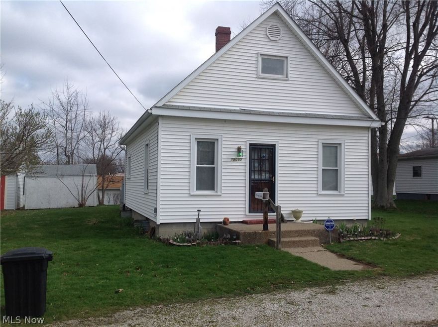 West Branch Schools, Cute house, needs some cosmetics but could be a real doll house. 1st floor bedroom, 2 bedrooms up stairs (no heat registers up stairs), kids used upstairs for bedrooms growing up. Nice size living room, eat in kitchen, very nice deck and yard. Vinyl siding. Square foot and all sizes estimated.