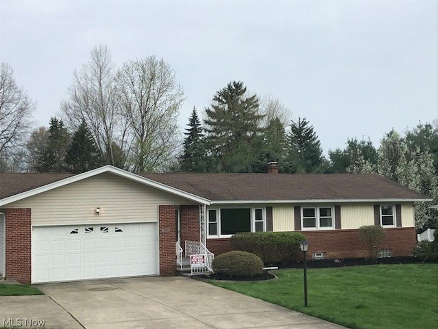 Quality built and well maintained large ranch home. 3 bedroom with large closets, 1.5 bathroom, 2 car attached garage, 2 living rooms, enclosed 4 season patio, open air pavilion and large storage shed. The home includes significant updates including, quality made kitchen cabinets with granite countertops, new updated bathrooms, some hardwood flooring and all new flooring, newer windows, roof, siding, high efficiency furnace, hot water heater,  glass block windows, dishwasher, lighting and more. This home that last long. Priced to sell in the Green local school district.