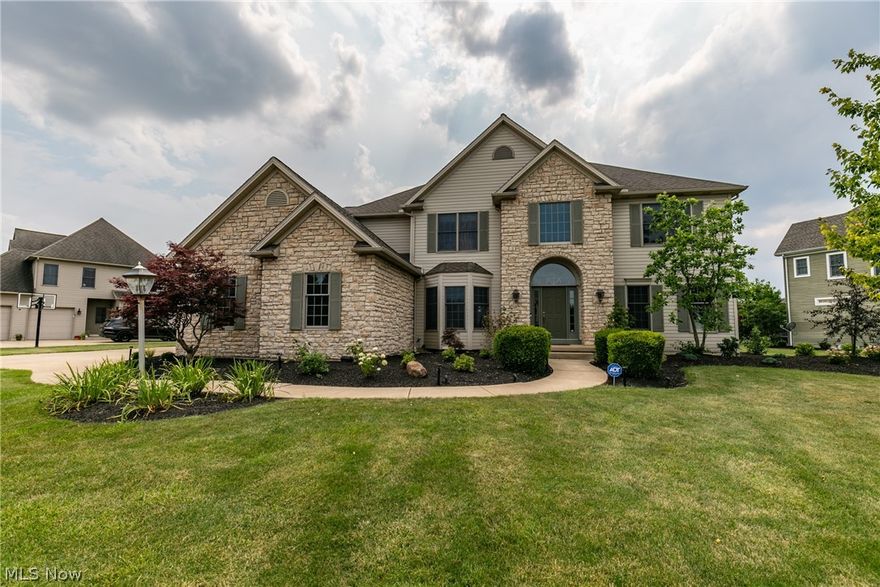 Beautifully appointed Colonial w/ over 5400sq.ft of finished living space nestled on just over 1/2 acre, on a low traffic dead end street. Attractive partial stone façade, 3 car side load garage & freshly landscaped yard(2021). 2 story entry, flanked by a lovely living room & formal dining room w/ bay window. Family room w/ soaring ceiling, wall of windows & cozy gas fireplace; opens to the eat-in kitchen for easy entertaining. The kitchen is complete w/ stainless steel appliances, rich cabinetry, granite counters, center island w/ seating & bayed dining area out to the paver patio, hot tub & large 2 tier deck(2020) to enjoy; w/ views of the spacious, treelined backyard. Private office w/ wood floors & custom cabinetry, Powder room & laundry room. Upstairs you will find, a large master suite w/ vaulted tray ceiling, huge full bath w/ jetted tub, shower, dual sinks & walk in closet. 3 additional bedrooms, 2 of which are connected by a jack & Jill bath, plus another full bath. The finish