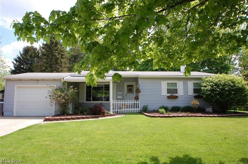 An exceptional 3 bedroom, 2 bath ranch with a finished basement. This lovely home has a completely fenced/private back yard with an all brick patio and a hot tub. Vaulted ceilings highlight the large living room that connects to the dining room. There is an attached garage, front porch, new hot water tank, updated windows, laundry room, and so much more.