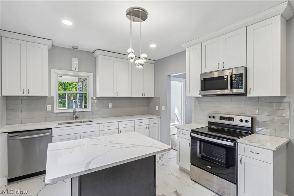 Photo of 4012 Bluestone Road, Cleveland, OH 44121 (MLS # 5213280)