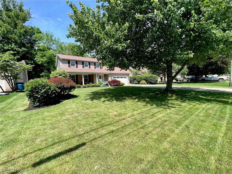 Not too big, not too small, this Beautiful 3 Bedroom, 4 bath home is JUST RIGHT! Located in a Quiet Neighborhood in Poland Schools, this home offers many updates & Tons of Curb Appeal! Updates Include: Kitchen flooring, cabinets, countertop & backsplash 2016, Windows 2014, Siding 2015, Master Bath vanity, floor & shower 2016, Living Room Carpet 2018, New Carpet in all Bedrooms 2018, New Garage Door 2016, ½ bath Vanity and Flooring 2016. Upon entering, you are greeted by a large foyer w/wide, wood staircase to the upstairs. Immediately to your right is a big living room w/newer carpeting & plenty of windows to allow in natural light. Next you will find the dining room w/ laminate flooring. The Gorgeous Eat-In Kitchen features tons of counters & cabinet space & opens to a cozy Family Room w/Stone Fireplace. Continue through the sliding doors to the massive 3 Seasons Room overlooking the private backyard w/stone patio perfect for hosting a BBQ or relaxing in the outdoors! The 2nd floor ho