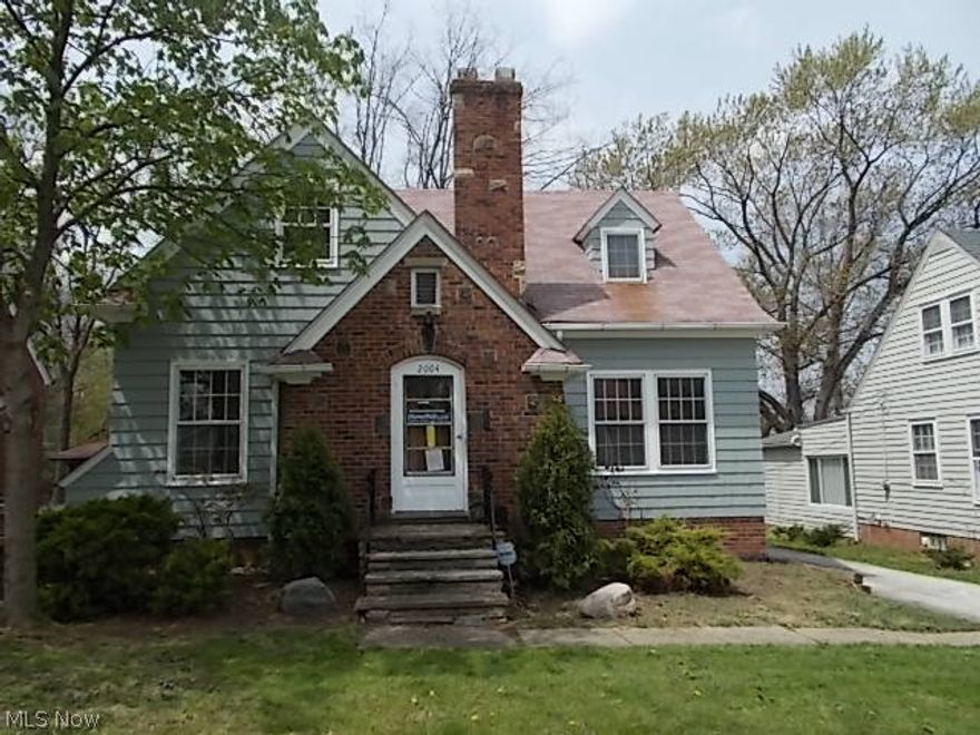 Spacious home just miles from the Lake County border and minutes to Downtown Cleveland! This charming Colonial features 4 Bedrooms, 2 full Baths and original hardwood floors throughout. The spacious eat-in Kitchen offers a pantry, tons of cabinet space and features an attached Sun Porch with skylights. Continue into the formal Dining Room and spacious Living Room with a decorative fireplace. There are 2 sizable Bedrooms on the first floor and 2 Bedrooms on the second floor with a Jack n' Jill Bath. 2 car detached Garage, a sand stone Patio in the private backyard, and a paved driveway. Owner Occ. Buyers & Agents must sign OwnerOccupant Certificate found in MLS Attachment in order to make offer.  This is a Fannie Mae HomePath property. Purchase this property for as little as 3% down!