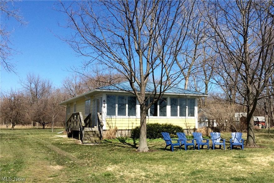 Location, Location, Location!!! 3 Bedroom, 1.5 Bath Ranch Sits On .81 Acres. Beautiful Sand Beach Just Steps From The Front Door With Views Of Marblehead and Cedar Point. Adjacent 1.6 Acre Lot (100 x 621) With Multiple Out Buildings Is Also For Sale, Now Only $298,500. Seller Will Accept $659,000 for all 3 parcels, house and outbuildings.