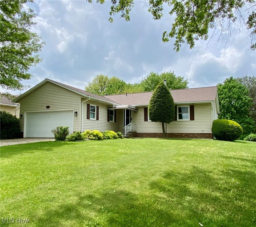 Don't miss this completely updated wonderful ranch style home with 3 bedrooms and 2 full baths. The gorgeous kitchen boasts custom Amish made cabinets, granite counters and stainless appliances, both bathrooms have been updated with new vanities and tile flooring. Additional updates include 3/8 inch bamboo engineered hardwood floors in the kitchen, dining room and foyer, tile floors in the bathrooms and mud room, a new wood-burning fireplace/stove in the family room, newer carpet, and fresh paint throughout. Enjoy the newly rebuilt back deck/covered porch with composite flooring and fresh paint, stamped concrete patio in the back yard as well as a storage shed for outdoor toys and lawn equipment. The possibilities are endless in the sprawling basement. The laundry area is currently in the lower level but the previous owners had the washer and dryer in the mud room on the first floor. New windows were installed in 2020 and the roof was replaced in 2021.