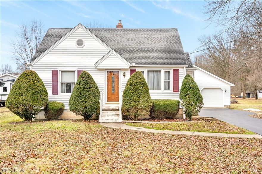 Stop your search HERE! Located at the edge of Austintown, this home is close to the interstate, shopping,dining & more! The home is situated on a large lot and features an oversized garage that has room for 2-3 vehicles plus all of your outdoor work, recreational or hobby items! Inside the house has been beautifully maintained with gorgeous hardwood floors in the spacious living room and running throughout the home. The living room opens to an updated eat-in kitchen with plenty of cabinets and storage. Appliances included. The 1st floor is also home to 2 bedrooms and a full bathroom. The 2nd floor features the 3rd bedroom, an additional bonus living space, and built in storage spaces. The full basement is partially finished with space for all of your storage or a possible rec room. This home is move in ready and available for immediate occupancy. Call today!