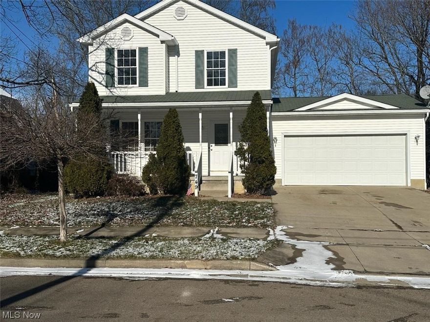 You don't want to miss your opportunity to own this well maintained 3 bedroom 2 bath home that is less than 20 years old sitting on 2 parcels of land. This home features a full front porch and attached 2 car garage. Inside there is new flooring and fresh paint throughout. The first floor consists of an ample size living room. The spacious kitchen comes equipped wih a stove, refrigerator and dishwasher.  The dining area has sliding patio doors that lead to the large fenced in back yard. Finishing off the first floor is a full bathroom. The second floor features three spacious bedrooms with large closets.  The full bathroom is accessible from the hall as well as the primary bedroom. This home has extra hallway closet storage space and wide a wide staircase. There is a full basement that can be finished to suit your needs. This home is a must see!