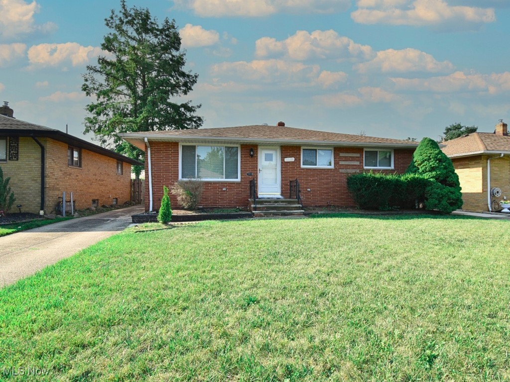 Discover this charming brick ranch featuring a fully finished basement! The home boasts a recently renovated kitchen and a newly updated first-floor bath. Enjoy generously sized rooms and beautiful hardwood floors throughout. The finished basement includes an additional bedroom and a full bath, offering plenty of space and versatility. Recent upgrades include new replacement windows, glass block windows, a newer roof, furnace, and hot water tank. Move-in ready and complete with a home warranty, this property is a must-see!