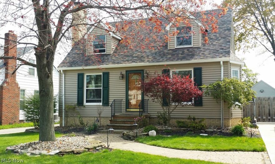 Super special Updated 4 Bedroom home that will have you at first sight! Beautifully updated kitchen and baths, Newer Furnace, Central Air, Roof & Drive!  An inviting Living room with wood burning fireplace and built-ins is open to the Bright Dining room with bay window hardwood floors corner built-ins full of charm and character. Updated kitchen with bay window, counter island, trendy soap stone and butcher block counter tops and all newer appliances that stay and are included with your purchase. A Cozy 1st floor bedroom off living room perfect as a baby/toddler room and is now being used as an office with half bath.  The 1st floor Master Bedroom is spacious with stunning private French doors to the shaded oustside deck.  Two more nice size bedrooms upstairs with full bath.  Basement has family rec room with second fireplace. Workshop area and storage.  Awesome fenced back yard with deck and fire pit.  Close to shopping, rec center, schools and restaurants.