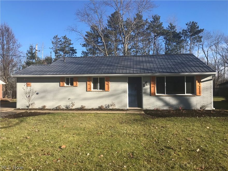 Come check out this stunning 3 bedroom ranch. Fall in love with this open-concept kitchen featuring white shaker cabinets, granite counter-tops, stainless steal appliances, an added pantry and breakfast bar. Be prepared to enjoy a worry free home with all the major renovations complete which include a new 30 year metal roof, double-pane energy efficient windows, electrical panel, hot water tank, and baseboard heaters/thermostats. Additional improvements are an added laundry/mudroom off the side entrance, vinyl floors in main living areas, interior/exterior doors, ceiling fans, and carpet in all the bedrooms. The bathroom has also been updated with a new vanity, toilet, and tub. This property sits on a beautiful quarter of an acre that backs up to the woods and includes a 2 car detached garage, large storage shed and paved driveway. Conveniently located just a short walk from the Chardon Square. Don't miss your chance to call this house your home.