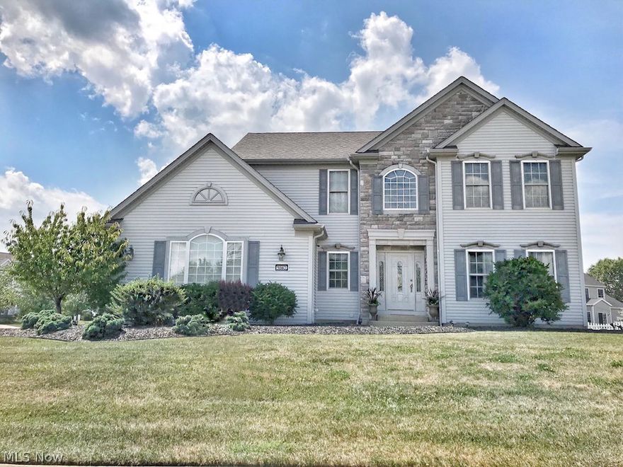 You will be at a loss for words when you walk through the doors of this beautiful and modern four bedroom, three and a half bathroom home located in Northhampton Highland Estates. Enter the home to a two story Foyer, formal dining room, and half bath. Large windows offer natural light in the great room along with a modern gas fireplace you can use during those cold winter nights. Next, a brand new gourmet kitchen with granite countertops, tile flooring and stainless steel appliances including a double oven and an induction cooktop. First floor laundry is off the kitchen. Head upstairs to your master suite with a spacious bathroom featuring double vanity and walk-in closet. You will find the other three bedrooms along with another full bath on this floor as well. The full finished basement offers tons of space for entertainment, a full bathroom and another room currently used as an exercise room. Finally, walk outside the new sliding door from the spacious eat-in kitchen to the custom m