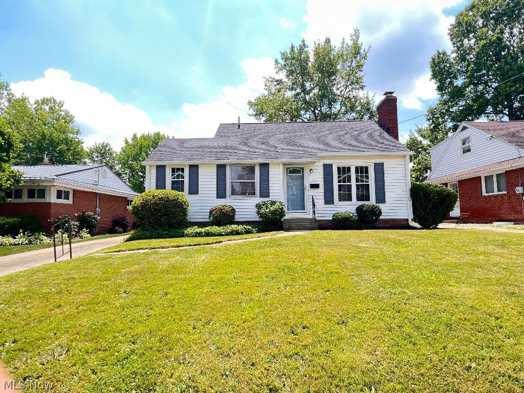 Beautifully updated 3 bedroom single family bungalow in North Canton within walking distance to Main Street shops, YMCA and more. This charming home has original hardwood floors through first floor, built in closets, updated kitchen with stove, dishwasher and refrigerator, and updated fixtures throughout. Original 1930s charm includes original doorknobs and hardwood floors mixed with modern updates. Kitchen, Dining room, living room, 2 bedrooms and full bath on first floor and bungalow upstairs. Full unfinished basement with glazed tile walls and plenty of storage. Lovely backyard with established landscaping and detached 2 car garage with automatic opener. New furnace, air conditioner and hot water tank in 2021.
North Canton public pickleball court is on the other side of garage. This is a quiet street with access to all that downtown North Canton has to offer.