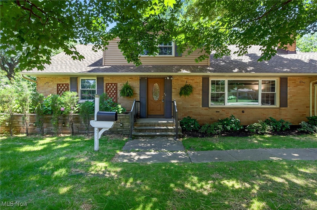 Nestled on a quiet street, this updated, brick Cape Cod is charming and timeless on the outside, while inside you'll find contemporary finishes, stylish fixtures, and a functional layout ideal for today’s lifestyle. This 3000+ sq ft home offers 4 spacious bedrooms including a primary suite that will make you the envy of the neighborhood. It features a spa-like bath with an oversized jacuzzi tub with a dedicated hot water heater allowing you to soak all night long. Steps away is your massive primary suite closet conveniently equipped with washer/dryer hookups and a laundry tub. Chef's kiss to the gourmet kitchen with granite countertops, double wall ovens and durable luxury flooring. It's a cook's delight. Storage reigns supreme in this home with closet space galore. The finished lower level recreation room is ideal for hosting family and guests or for those weekend movie nights. Cancel your gym membership and enjoy the custom home gym. If you love the outdoors, escape the summer heat under the trees on the freshly seeded lawn or sip a lemonade on the spacious, enclosed patio. Home warranty included. This home is a must see. Schedule your private tour today.