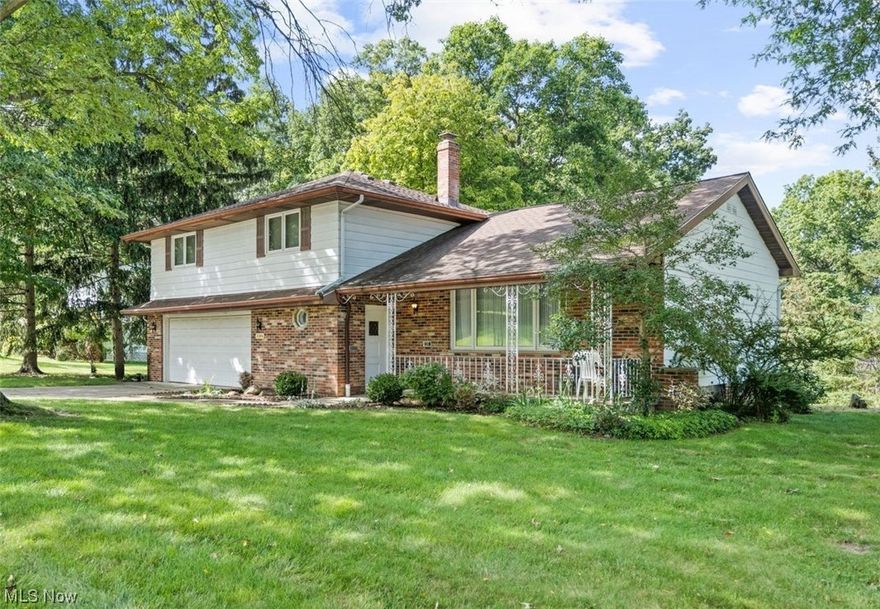 Are you looking for a house with great bones in a nice neighborhood? A place you could build equity and create the home of your dreams? If so, then this is the house for you! This classic split level has been with the same owners for the past 47 years and is waiting for a new family to make it their own. The covered front porch is a great spot to relax and take in the neighborhood. Walking into the entryway you'll find a large hall closet and a 1/2 bath. Down the hall is the cozy family room with wood burning fireplace and sliding doors to the large rear yard. Up a few steps is the eat-in kitchen which is conveniently located off the spacious living & dining rooms. The 3rd level is where you'll find 3 nicely sized secondary bedrooms and a full bath as well as the primary bedroom with 2 closets and its own en suite bathroom. The lower level of the home has a semi-finished rec room, storage and the laundry area.  With multiple spaces to entertain, relax and live, this home has it all. Sc