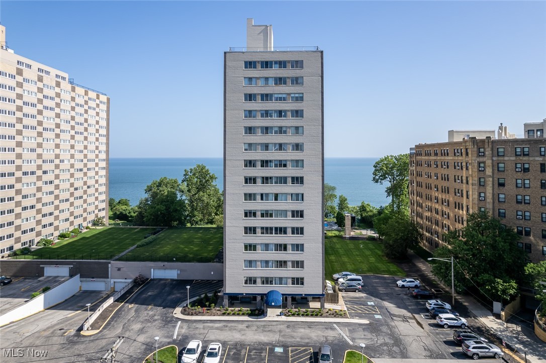 Situated on the 16th floor of Marine Towers East, this move in ready high-rise condo offers breathtaking views of Lake Erie and the Cleveland skyline. Inside, the open-concept layout features neutral tones, warm colored flooring, and expansive windows that flood the space with natural light & beautiful lake views & fireworks displays from the ballpark or the 4th of July, all without the inconvenience of crowds. The kitchen is equipped with white cabinetry, matching appliances, a stylish backsplash, and generous counter space, making it both functional and inviting. The bedroom is comfortably sized with double closets, and the bathroom features timeless finishes. New electrical panel,dishwasher and garbage disposal. Right outside the unit’s door, you’ll find convenient access to the elevators, laundry, and trash chute—no long hallway treks required. This condo is situated directly below the top floor, meaning there’s no one above you. Just one floor up is the party room and rooftop access, where you can unwind and take in the lake breeze, vibrant sunsets, or a peaceful sunrise. Ample outdoor parking is available, and garage spaces can be rented on the lower level. Marine Towers East also offers a variety of amenities including a pool, grilling stations, picnic areas, and designated spaces for dogs, plus a studio rental for $65/night for residents guests-providing a full, resort-style experience right at home. Just minutes from Edgewater Park, the marina, the Cleveland Bikeway, Whiskey Island, and downtown, the location is perfect for both outdoor lovers and city explorers!
