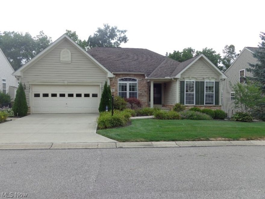 Former Model Home In The Woods Of Glencairn!! Still Shows Like A Model!! New Kitchen and LED Lighting!! Newer furnace And Central Air!! Epoxy Garage Floor In Heated Garage!! Newer Driveway And Sidewalk!! Automatic Awning Over Upper Deck!! Full Finished Walk Out Lower Level!! Security System On All Doors And Windows!! Trex Deck And Trim Recently Painted!! Lower Level Bar, Movie Room, Bedroom!! Lot Backs Up To Woods-Very Private!! All Appliances Including Washer-Dryer Stay!! Excellent location!! Nothing To Do But Move In!! Occupancy Probably Mid October!! Not Many Like This One!! Wont Last!!